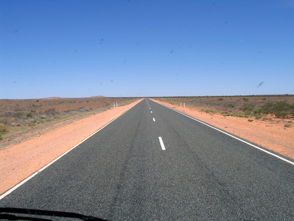 Remote outback highway in Australia — driving on restricted roads voids all campervan rental insurance cover