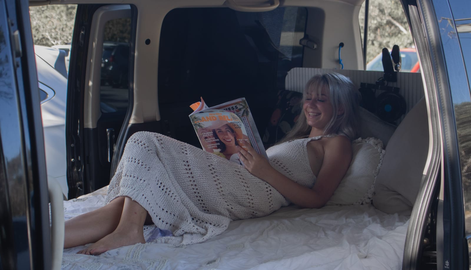 Johnny Feelgood campervan bed made up inside the van